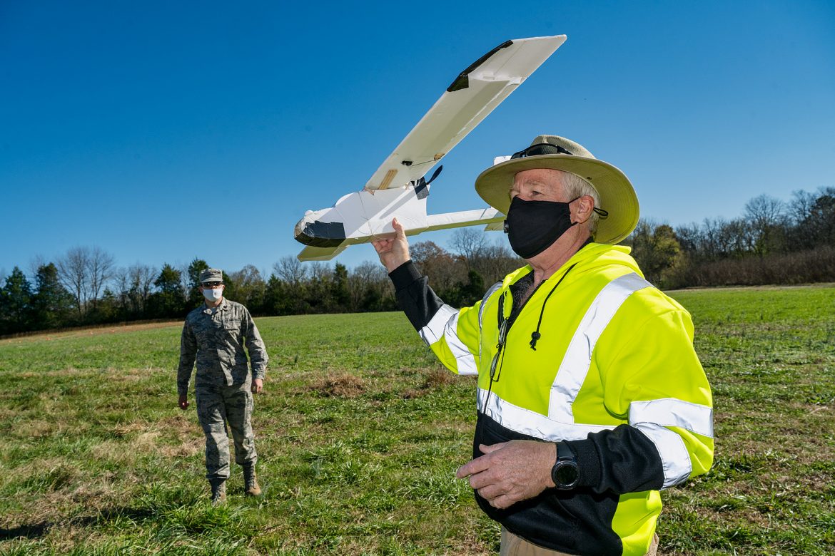At the MTSU Farm in Lascassas, Tenn., Kevin Corns, assistant professor in the Department of Aerospace and Unmanned Aircraft Systems Operations program director, flies a fixed-wing drone his students in an upper-division UAS class built. Corns and the UAS program are part of a multi-institutional, three-year, $750,000 USDA/NIFA grant to establish the Tennessee Digital Agriculture Center at MTSU to enhance youth education. (MTSU file photo by Andy Heidt)
