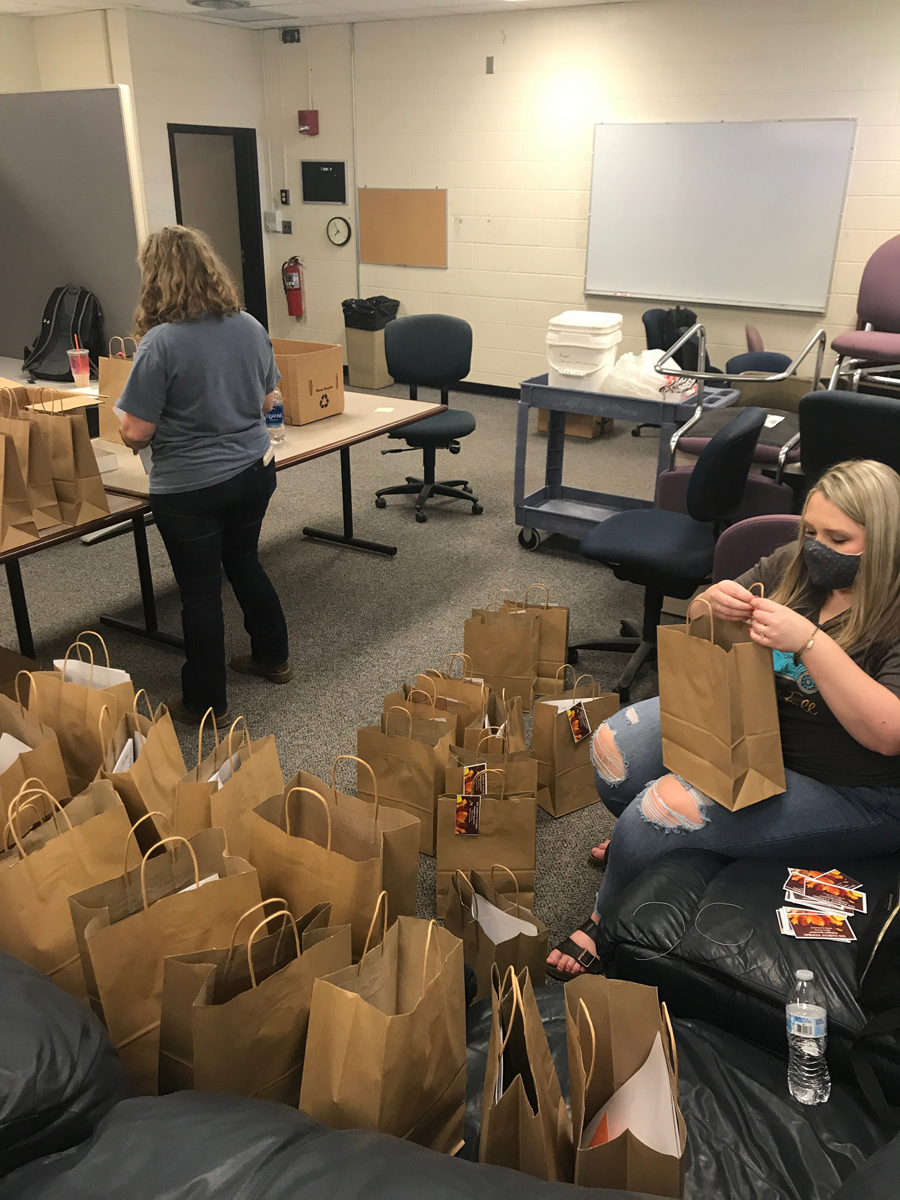 Gracey Law, right, and other MTSU School of Agriculture agritourism class members prepare the Harvest Handbags, which were taken to Homer Pittard Campus School. (Submitted photo MTSU agritourism class)