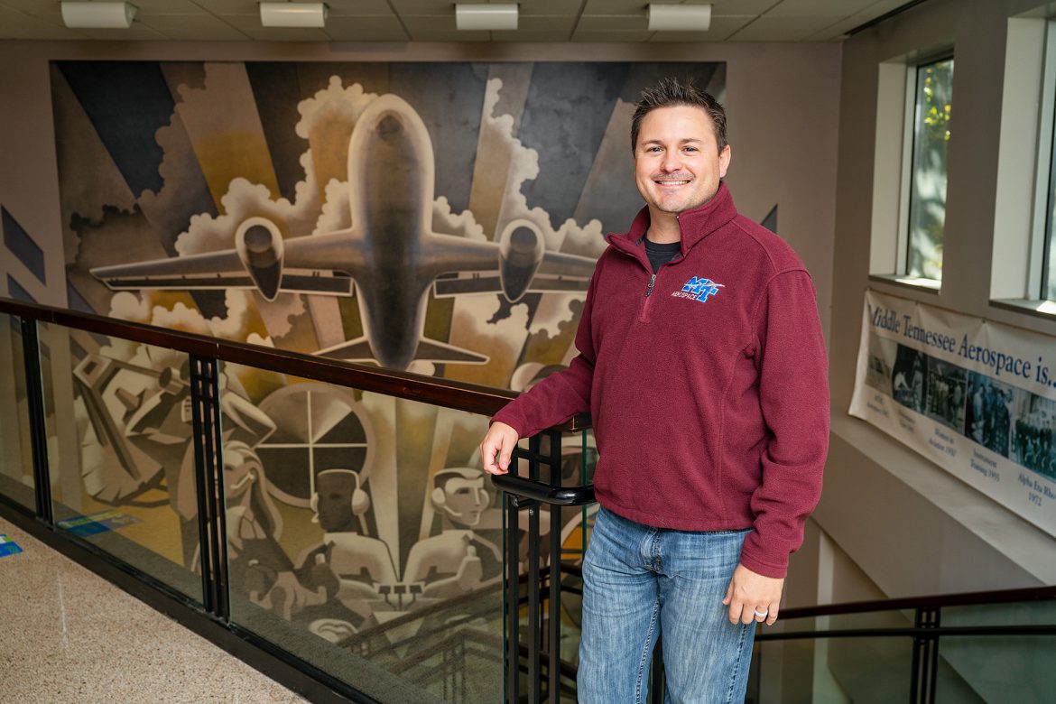 Tyler Babb, Professional Pilot Concentration Coordinator, Aerospace faculty in and around the Business and Aerospace Building. (Photo: Andy Heidt)