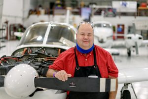 Bill Allen, Aerospace faculty in the maintenance hanger at the Murfreesboro Airport campus. (Photo: J. Intintoli)