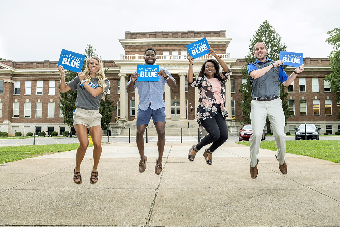 Middle Tennessee State University students show off their True Blue pride for a promotional photo on campus on March 28, 2017. (MTSU file photo by J. Intintoli)