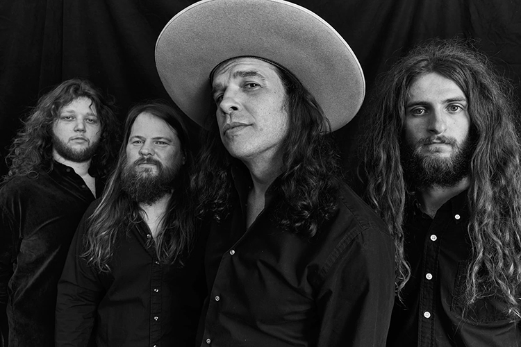The Nashville-based psychedelic country-rock band Cordovas, shown here, will join the Sunday-night lineup at Middle Tennessee State University's WMOT 89.5-FM Roots Radio this Sunday, Jan. 17, with their unique two-hour show, "Strange Roots Radio." From left are band members Lucca Soria, Toby Weaver, frontman and show host Joe Firstman, and Sevans Henderson. (photo by Joseph Ross/The Cordovas)