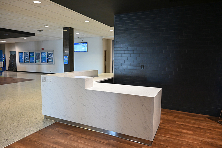 The recent renovation of the Keathley University Center lobby at Middle Tennessee State University updated the space for the first time since 1967 with wood floors, a large, modern information desk, multiple seating areas and a dark blue accent wall pictured here on Feb. 5, 2021. (MTSU photo by Stephanie Barrette)
