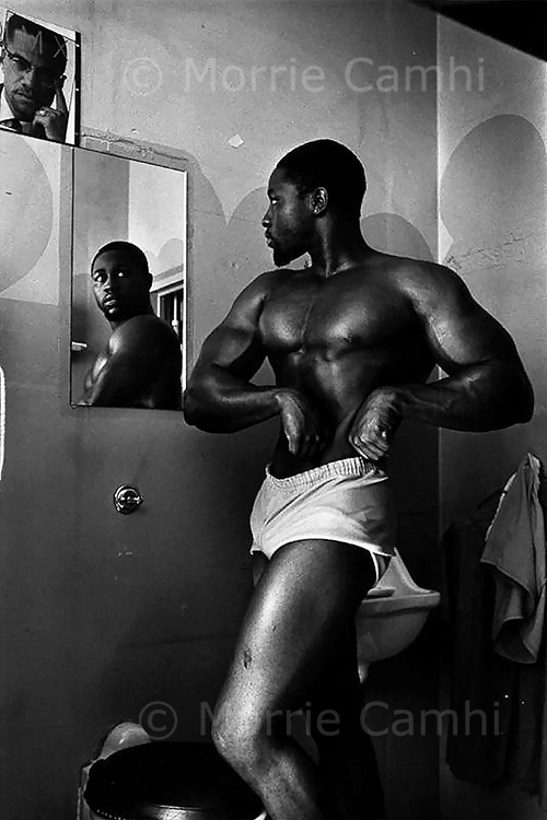 Documentary photographer Morrie Camhi's image of "Kenneth X. White, Prisoner in His Cell, 1987," depicts a young man checking his physique in a mirror in his cell at the California State Prison at Vacaville, part of Camhi's "The Prison Experience" collection. This photo is among those in a new exhibit in MTSU's Baldwin Photographic Gallery, "An Eye Towards Justice," on display through Thursday, April 15. The exhibit and Camhi's work also arethe subject of an online panel discussion with MTSU faculty experts set for Tuesday, March 30, at 6:30 p.m. Central. (photo by Morrie Camhi)