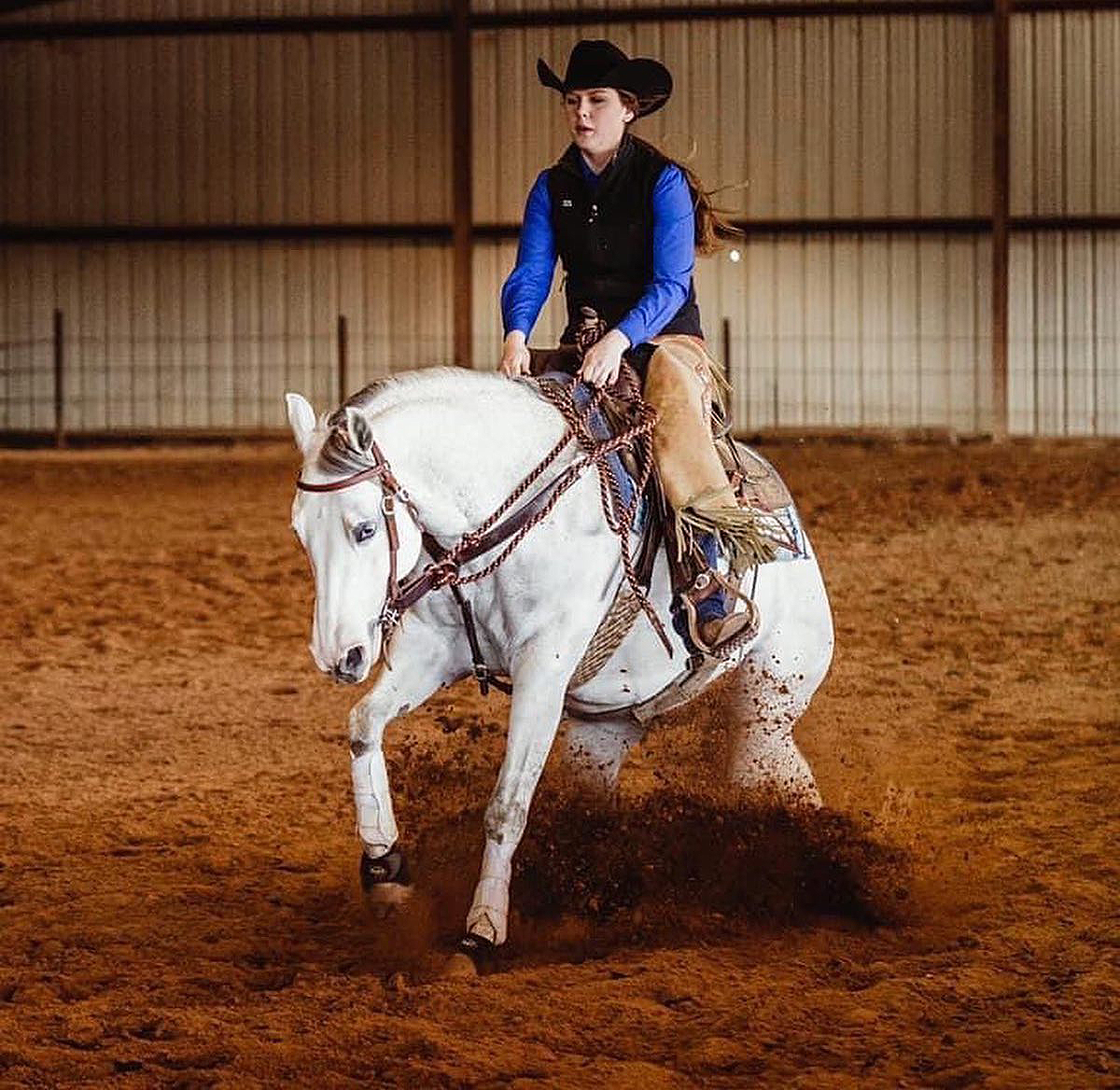 JoBeth Scarlett, a sophomore animal science major from New Market, Tenn., rode Dontjacwithmyspook to the ASHA National Novice Trail, Reining and Cow horse Class championship in the National Champion, Novice division April 16-17 in the Nolan County Coliseum in Sweetwater, Texas. (Submitted photo by Abbey Bratcher)