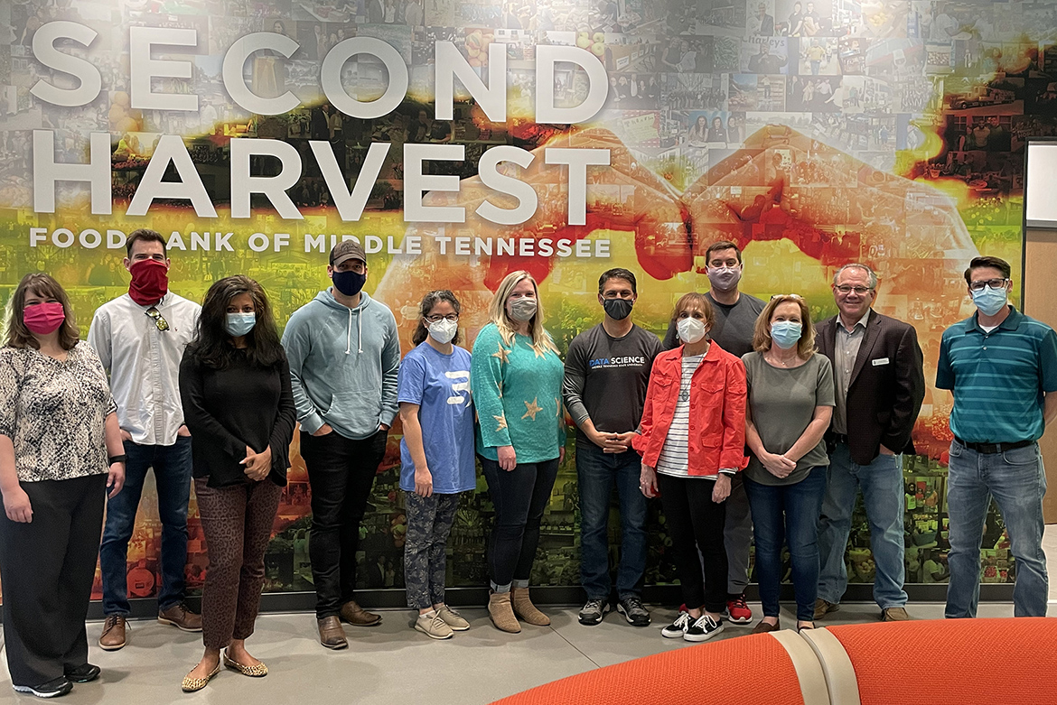 Some students in the inaugural cohort of MTSU’s data science graduate certificate program visit Second Harvest Food Bank of Middle Tennessee’s warehouse location in Nashville, Tenn., on April 11. Second Harvest provided the group access to some of its databases as part of the students’ final class project. Pictured, from left, are students Tammy Wiseman, McKinley Tidwell, Shalini Gupta, Vince Herbert, Ying Ding, Emily Hines; Charlie Apigian, co-director of the MTSU Data Science Institute and professor; student Sheryl Dusek; Ryan Otter, institute co-director and professor; student Beverly Meadows; Frank Ellmo, Second Harvest’s senior director of operations; and David Tinsley, director of information systems and information technology at Second Harvest. (Photo by Charlie Apigian)