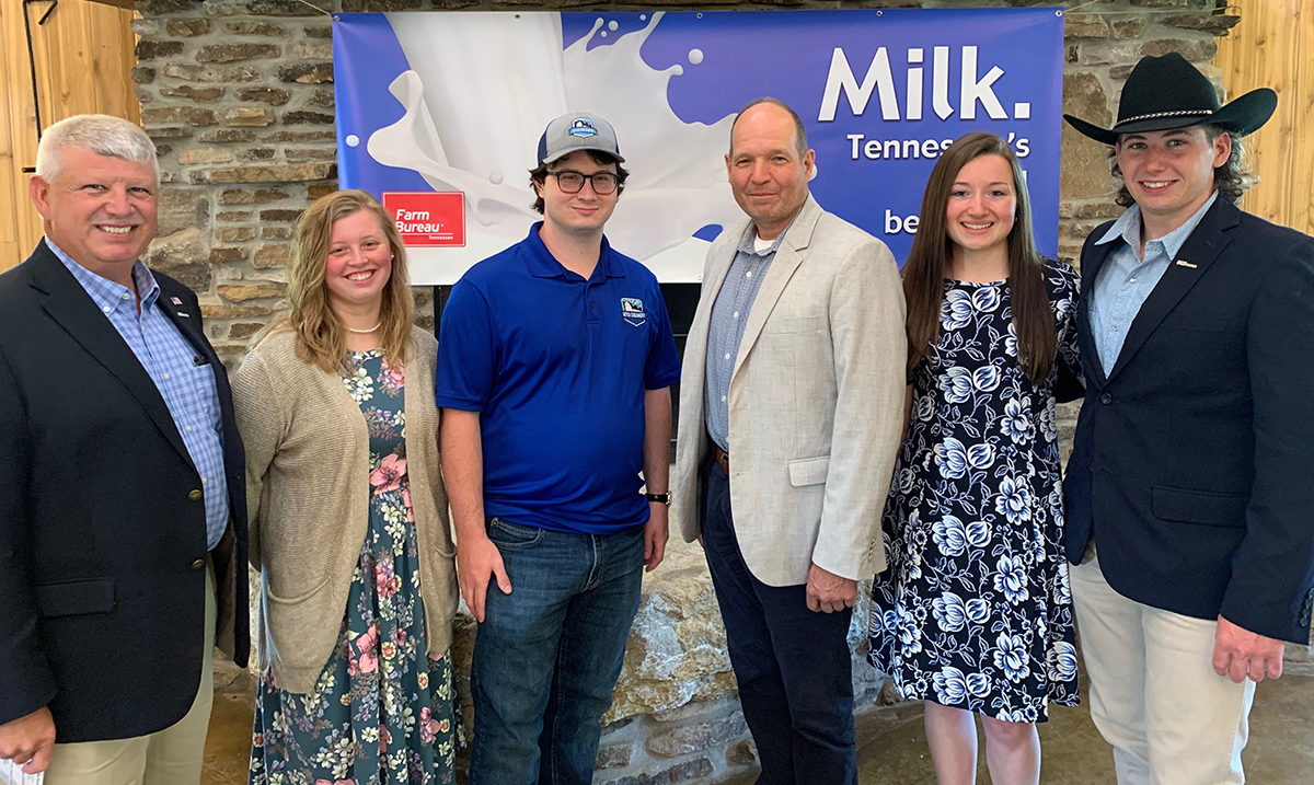 Matthew Wade, left, Megan Sentell, Scott Ayers, Tennessee Department of Agriculture Commissioner Charlie Hatcher, Erin Coleman and Joshua Wade attend the June Dairy Month Kickoff Friday, May 23, at Battle Mountain Farm in College Grove, Tenn. Matthew Wade is the MTSU Farm Laboratories director. The four students work in the milk processing plant. (Submitted photo)
