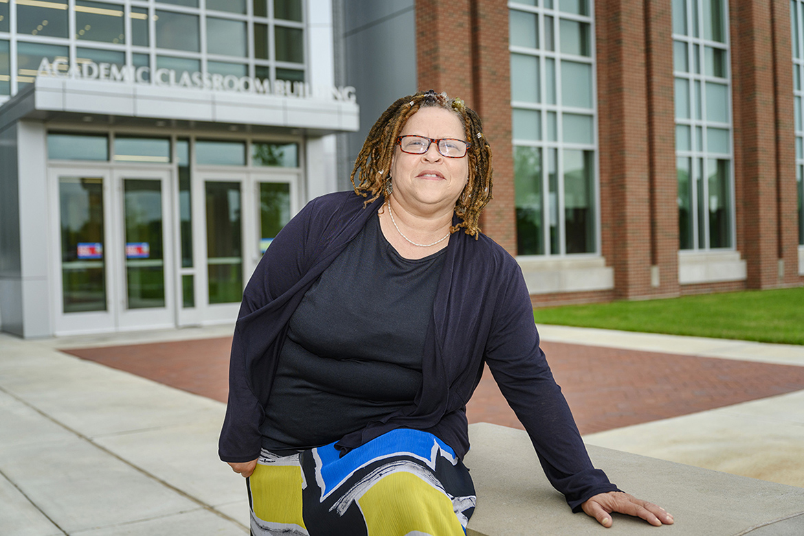 Carmelita Dotson, a lecturer of social work, poses outside the Academic Classroom Building. Dotson teaches classes in the MT Engage program, which employs high-impact strategies to get students more involved in their educational careers. (MTSU Photo by J. Intintoli)