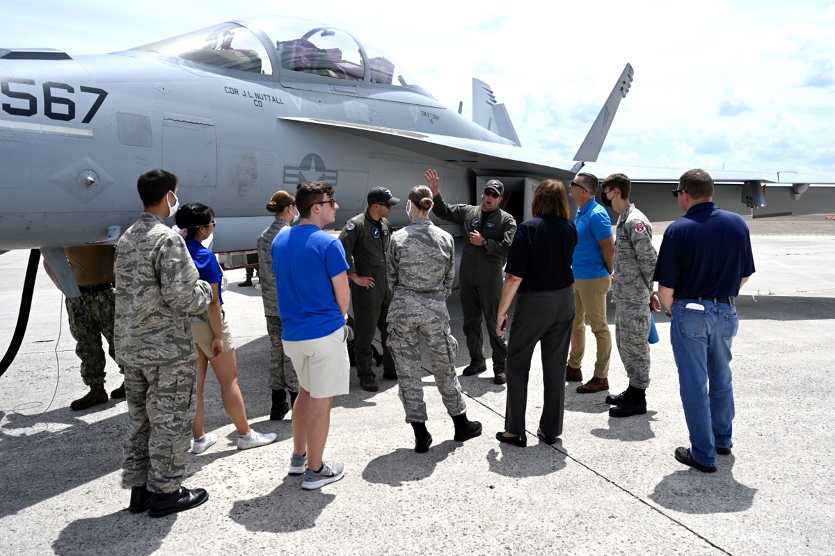 U.S. Navy Lt. Thomas Demonbreun, a Murfreesboro native with family ties to MTSU, explains various aspects of the EA-18G Growler he flies in air shows and helps train future pilots. His Navy VAQ-129 Squadron is participating in the Great Tennessee Air Show at Smyrna, Tenn., June 5-6. (MTSU photo by J. Intintoli)