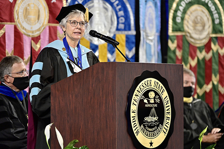 Debra Sells, vice president for Student Affairs and vice provost for Enrollment and Academic Services, welcomes new freshmen and transfer students during University Convocation held Saturday, Aug. 21, at Murphy Center. (MTSU photo by Andy Heidt)