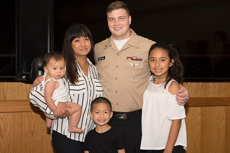 MTSU senior and U.S. Navy veteran Logan Stepp, left, is pictured with his wife, Zsarel, and three of their four children in this undated photo. Stepp, who graduated high school and originally attended MTSU in 2009, returned to college nearly a decade later and is set to earn his bachelor’s degree in Professional Studies with a concentration in information systems technology in December through University College. (Submitted photo)