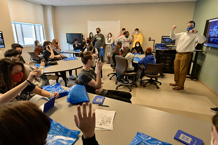Matthew Taylor, an assistant professor of journalism and strategic media, engages an audience of Blackman Collegiate Academy students in a discussion of social media at the College of Education Building during the group's Oct. 21 visit to MTSU. (MTSU photo by Andy Heidt)