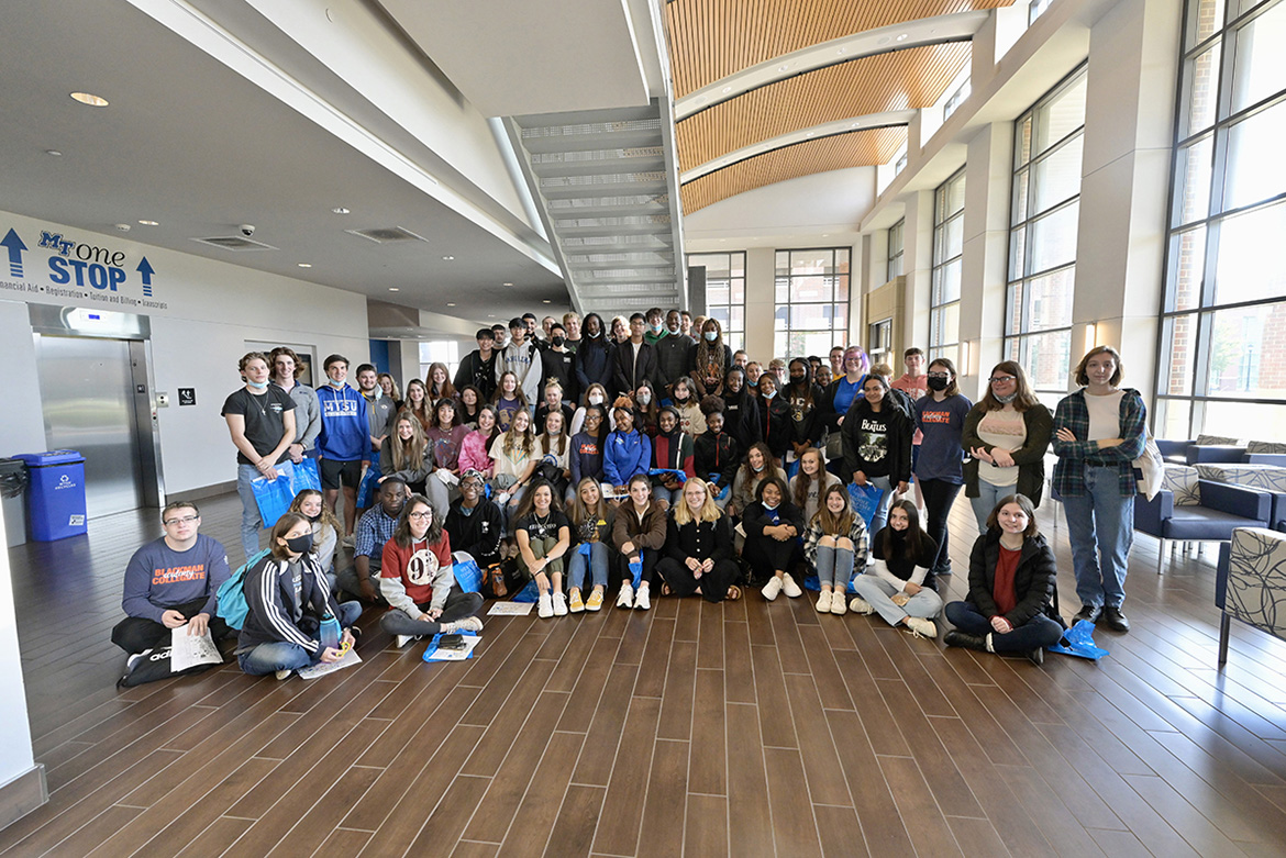 Some 70 students from Blackman Collegiate Academy pose for a group photo on the first floor of the MT One Stop during their Oct. 21 tour of MTSU. (MTSU photo by Andy Heidt)