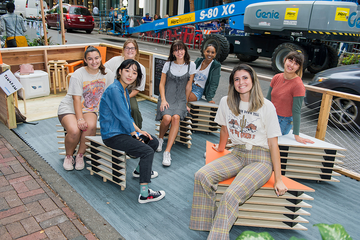 MTSU interior design majors pose at their project for the Park(ing) Day competition, in which the MTSU team captured the "Best Overall" award from the Nashville Civic Design Center Sept. 17. From left are Malina Miller, Makayla Morrical, Ashlee Young, Jazmyn Carothers, Anna Nunnari, Emily Glass, and Eunseob Lee. (MTSU photo by James Cessna)
