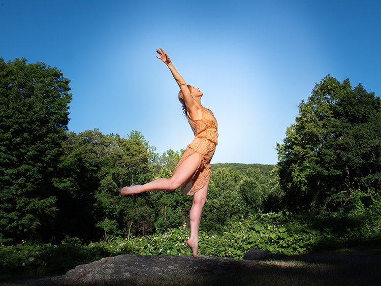MTSU Dance Program Director Meg Brooker stands en pointe in the sunshine as part of a dance performance inspired by nature in this 2019 file image. Brooker and guest dance educator Patricia Collins will lead “The Body in Nature," the first workshop in a new community arts series, this Saturday, Oct. 9, from 10 a.m. to noon at the Discovery Center at Murfree Spring, 502 S.E. Broad St. (Photo courtesy of Nina Wurtzel)