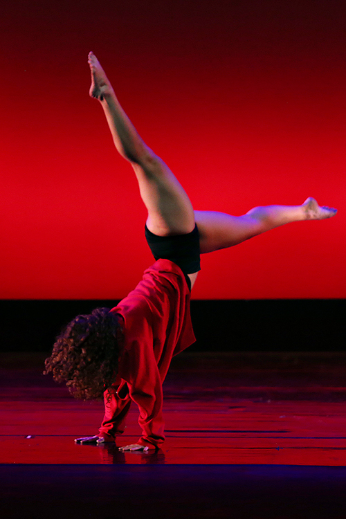 A student member of the MTSU Dance Theatre does a handstand on the Tucker Theatre stage in this file photo from a previous Fall Dance Concert. MTSU Dance will present its 2021 Fall Dance Concert Thursday-Saturday, Nov. 18-20, at 7:30 each night in Tucker Theatre on campus, and tickets are available at https://mtsu.edu/theatreanddance. (file photo by Martin O’Connor)