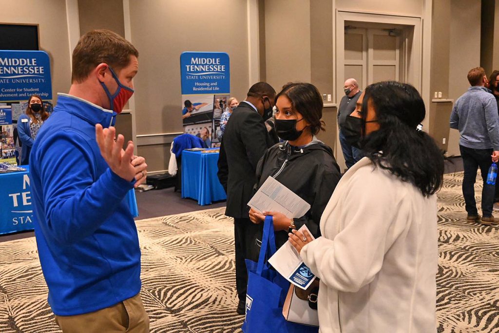 Memphis attorney and MTSU alumnus Brandon McNairy (Class of 2010) visits with prospective students attending the recent MTSU True Blue Tour at Esplande Memphis in Cordova, Tenn. The event attracted dozens of prospective students learning what the university has to offer. (MTSU photo by John Goodwin)