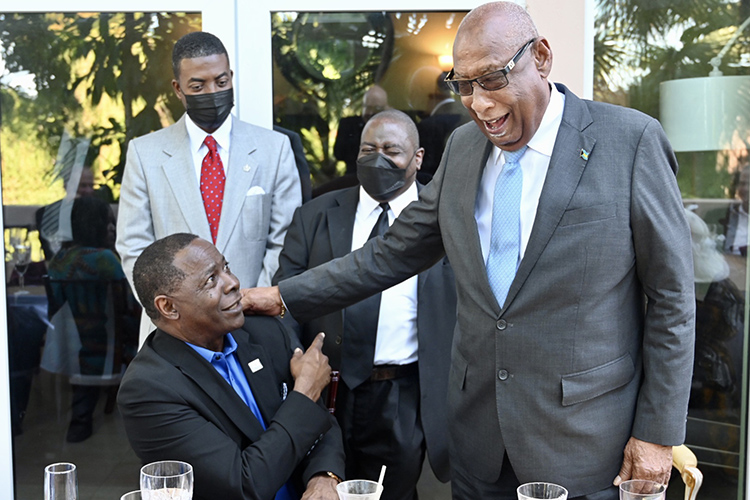 Bahamas Governor-General Sir Cornelius A. Smith, right, congratulates MTSU President Sidney A. McPhee, a native of The Bahamas, for his 20 years as the university’s top leader. (MTSU photo by Andrew Oppmann)
