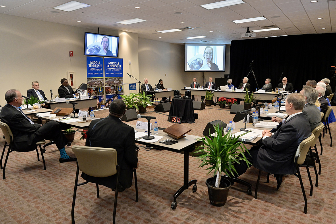 Emily House, executive director of the Tennessee Higher Education Commission, appearing on screen via Zoom, briefs the MTSU Board of Trustees during its quarterly meeting Wednesday, Dec. 8, 2021, on a recent report by THEC’s Black Male Success Initiative, which spelled out the “staggering education attainment gap” faced by such students at all Tennessee universities. (MTSU photo by Andy Heidt)