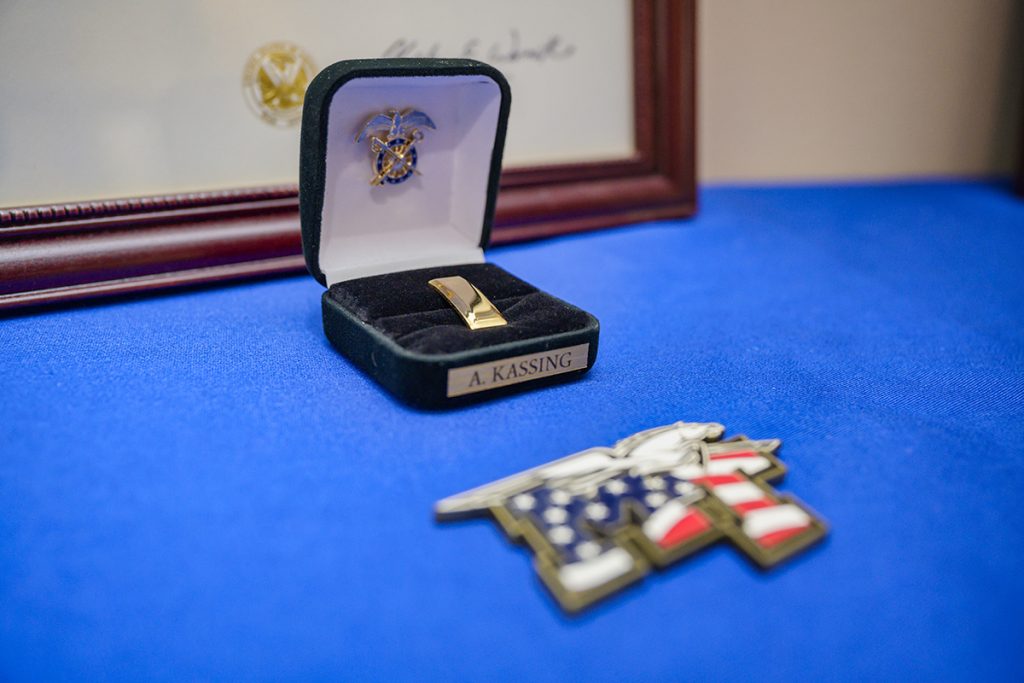 The second lieutenant gold bars for MTSU graduating senior cadet Alana Kassing of Smyrna, Tenn., sit on a table in Cantrell Hall inside the Tom H. Jackson Building before the start of the MTSU Blue Raider Battalion Fall Commissioning Ceremony Friday, Dec. 10. Kassing was one of three cadets commissioned during a brief ceremony. (MTSU photo by Andy Heidt)