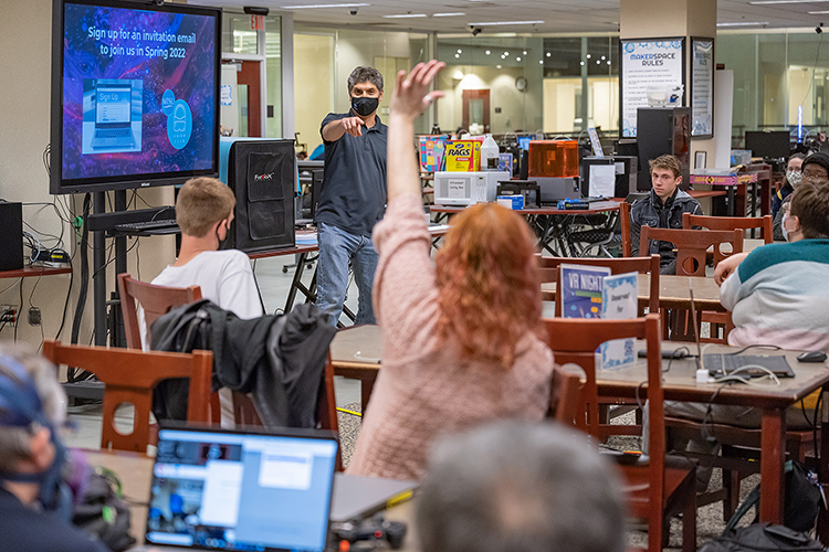Rodrigo Gomez, an assistant professor of animation in the Department of Media Arts, answers a question during the Nov. 17 VR Night held in the Makerspace to introduce students to the tools, technology and resources available in the James E. Walker Library. (MTSU photo by Cat Curtis Murphy)