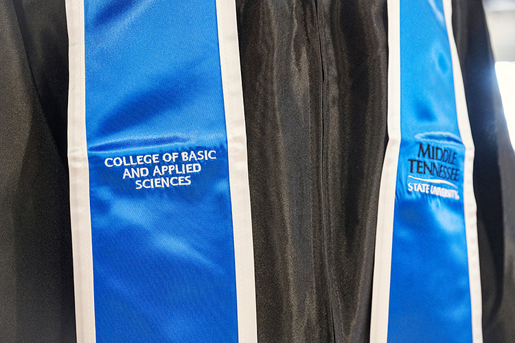 This close-up view shows the embroidered "College of Basic and Applied Sciences" stole with the MTSU trademarked text logo as an example of the new college-specific stoles that all 2021 graduates can begin buying Friday, Dec. 3, in the university's Phillips Bookstore in the Student Union to wear at their Saturday, Dec. 11, commencement ceremonies. (MTSU photo by Andy Heidt)