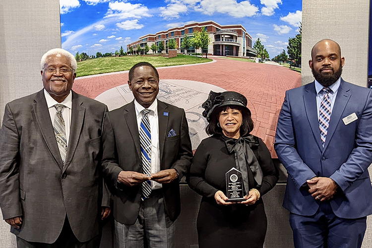 MTSU President Sidney A. McPhee, center left, and his wife, MTSU first lady Elizabeth McPhee, center right, were presented special awards by the Murfreesboro Branch of the NAACP for their ongoing community service and support of underserved student populations at the university and Murfreesboro City Schools. The McPhees were presented the NAACP’s President’s Awards during a virtual Martin Luther King Jr. and Social Justice Celebration that was broadcast Monday, Feb. 21. NAACP first vice president, the Rev. Goldy Wade, far left, and NAACP Executive Committee member Aaron Treadwell, an MTSU assistant professor of history, presented the awards on behalf of current NAACP President Katie Wilson. (Submitted photo)