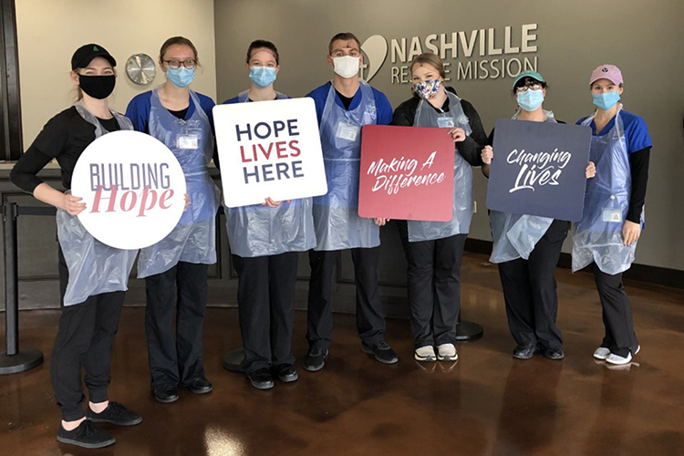 These MTSU nursing students volunteered to prepare and serve meals at the Nashville Rescue Mission in the Fall 2020 semester. Students in the nursing program will resume visits this semester. (Photo provided)