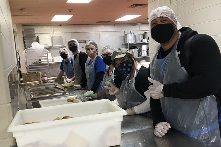 MTSU nursing students pose in the Nashville Rescue Mission kitchen while preparing food as part of a volunteer experience in the Spring 2021. (Photo provided)