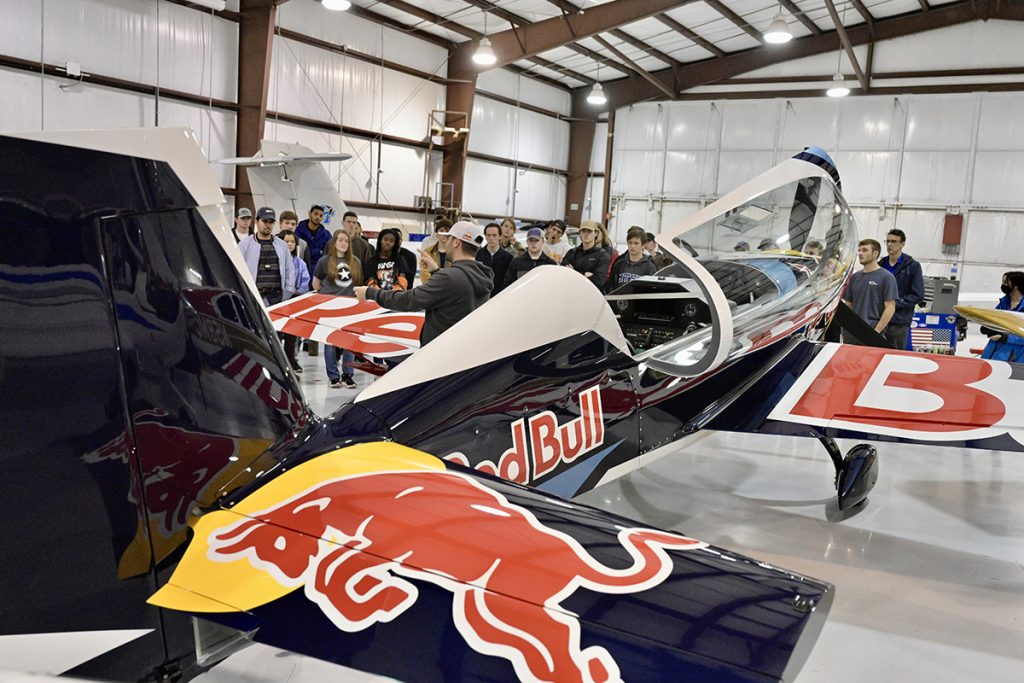 With the company’s airplane in the foreground, Kevin Coleman, Red Bull Air Race Challenger Class pilot Kevin Coleman discusses the upcoming Paper Wings qualifying event and fields questions from MTSU students Tuesday, Feb. 22, at the Donald McDonald Hangar at aerospace’s Flight Operations Center at Murfreesboro Airport. All MTSU students are eligible to register for the Paper Wings event, to begin at 4 p.m. Wednesday, March 3. (MTSU photo by Andy Heidt)