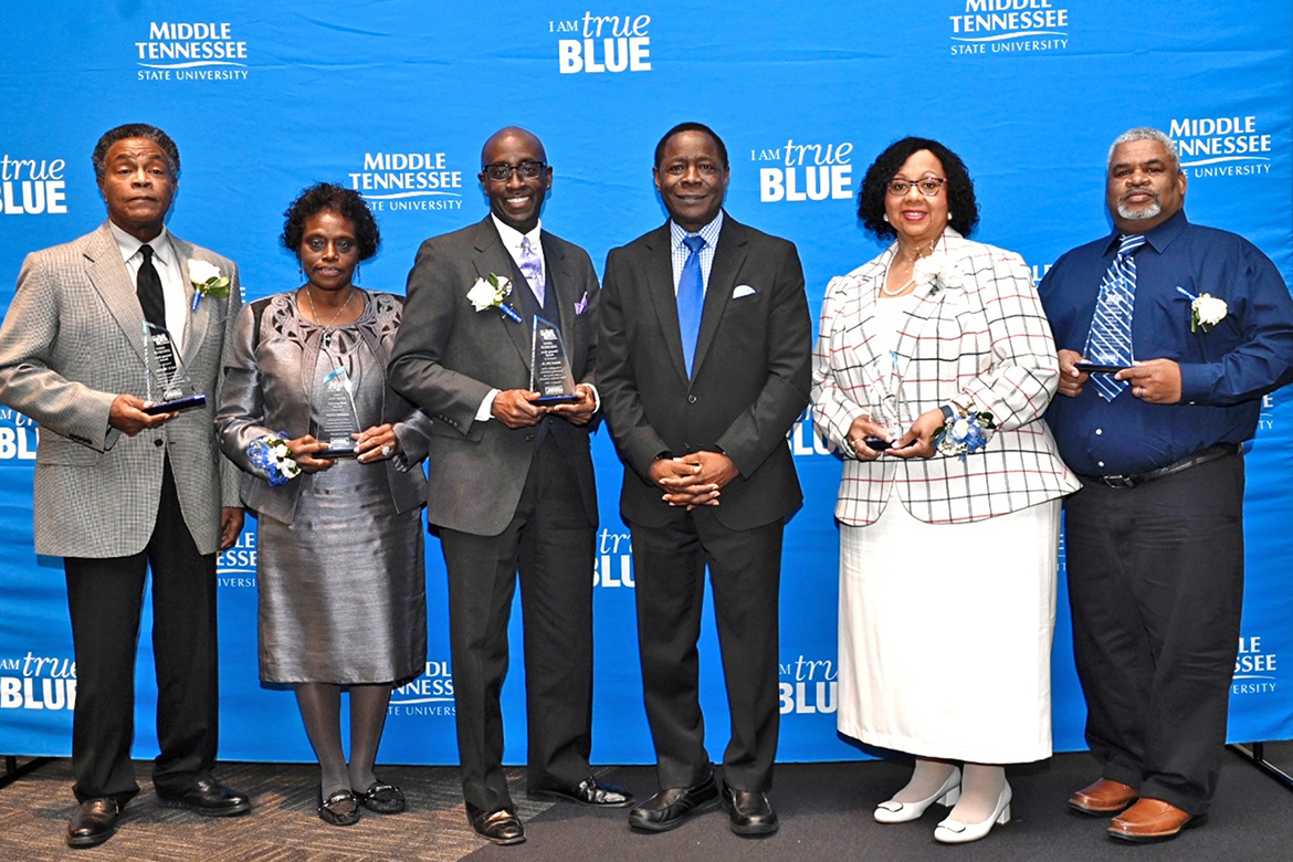 "Unsung heroes" of the Black community were honored for their lifelong achievements in five categories at the 26th annual Unity Luncheon Feb. 10 at MTSU. From L, Carl E. Watkins, Advocate of Civility; Melbra Simmons, Community Service; Robert Orr Jr., Contribution to Black Arts; MTSU President Sidney A. McPhee; Elma Black McKnight, Education; and Thomas Keith, Excellence in Sports. (MTSU photo by J. Intintoli)