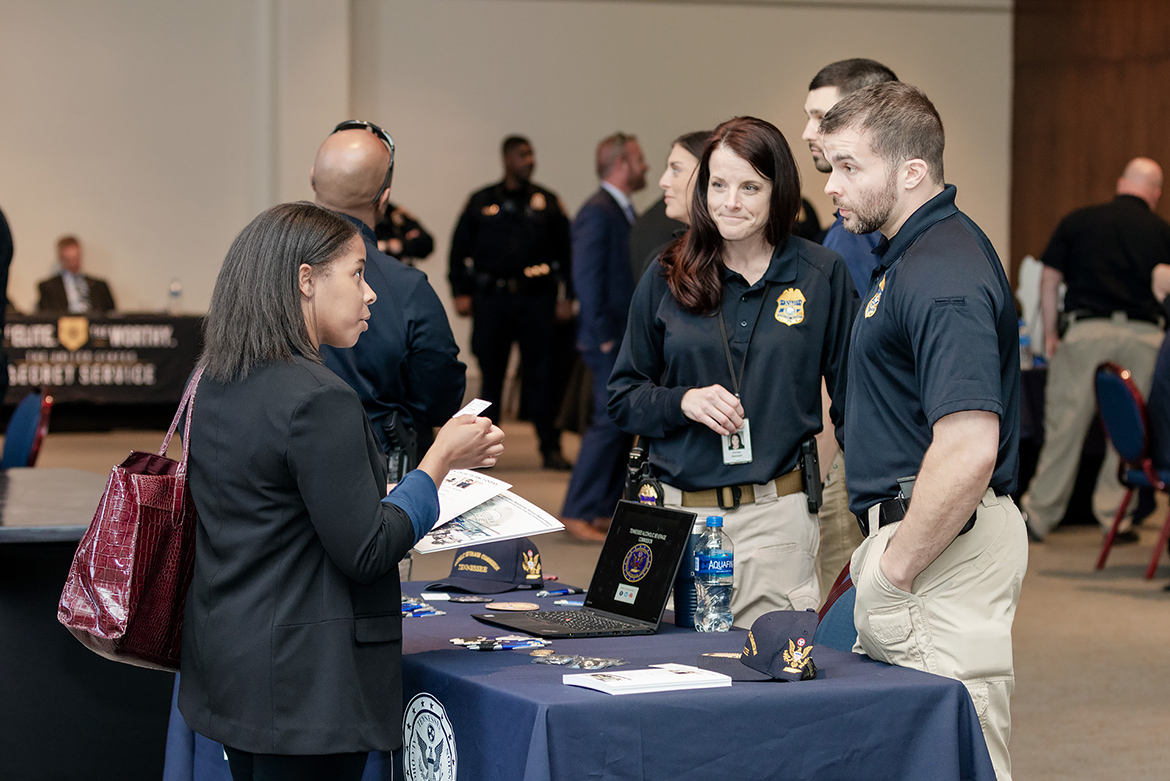 In this spring 2019 file photo, MTSU student Alexis Wynn speaks with law enforcement professionals at the Criminal Justice Networking exchange event in the James Union Building's Tennessee Room. Sponsored by the MTSU Department of Criminal Justice Administration, the spring 2022 event will be held Wednesday, March 23, in the Academic Classroom Building. (MTSU file photo by James Cessna)