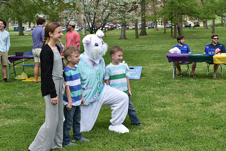 The Easter Bunny poses for photos with children participating in the MTSU Panhellenic Council's 2019 Easter Egg Hunt on the lawn of the President’s House. The 2020 hunt was canceled because of COVID-19 protocols, and the 2021 event was conducted in a drive-thru format. The 2022 event returns to an in-person format on April 10. (Photo submitted)