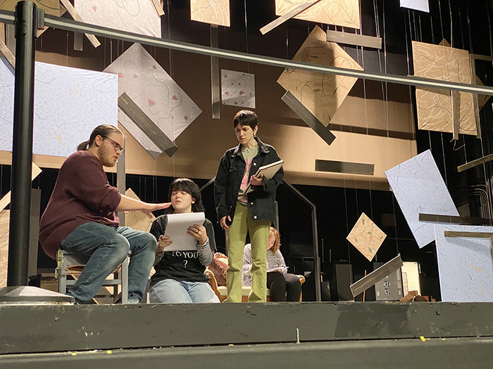 Cast members for the April 7-10 MTSU Theatre production of "Fun Home" work on a scene during rehearsals in Tucker Theatre. From left are theatre majors Payton McCarthy of Murfreesboro, who portrays Bruce, and Emma Bastin of Lebanon, Tenn., as Small Alison; theatre education graduate student Julia Degnan of Murfreesboro as Alison and theatre major Carmen Dennison Arlington, Tenn., who portrays Helen Bechdel. Information on tickets, a digital program listing the cast and crew, and more show details are available at https://mtsu.edu/theatreanddance/funhome.php. (MTSU Theatre photo)