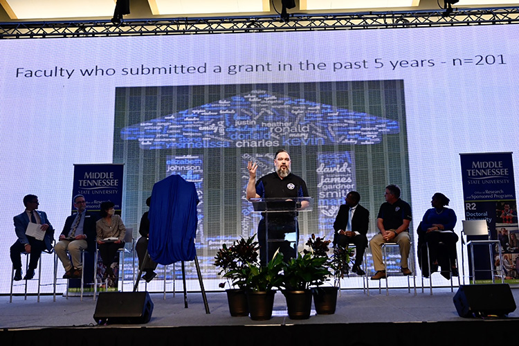 David Butler, Middle Tennessee State University vice provost for research and College of Graduate Studies dean, recognized the MTSU faculty contributing to the overall research efforts of the university at the announcement of the university’s historic elevation to R2 “High Research Activity” Carnegie classification status on March 25, 2022, at the ballroom of the Student Union Building on campus. (MTSU photo by J. Intintoli)