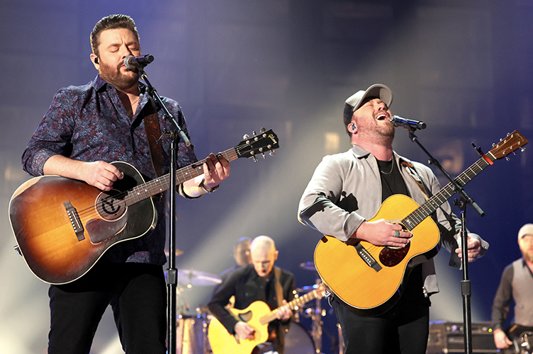Chris Young, left, and Mitchell Tenpenny perform during the 57th Academy of Country Music Awards at Allegiant Stadium March 7 in Las Vegas. Young, a former MTSU student who led this year's nominations with seven for his "Famous Friends" project, teamed up with commercial songwriting graduate Tenpenny for the new duet they performed, "At the End of a Bar." (photo by Rich Fury/Getty Images for ACM)