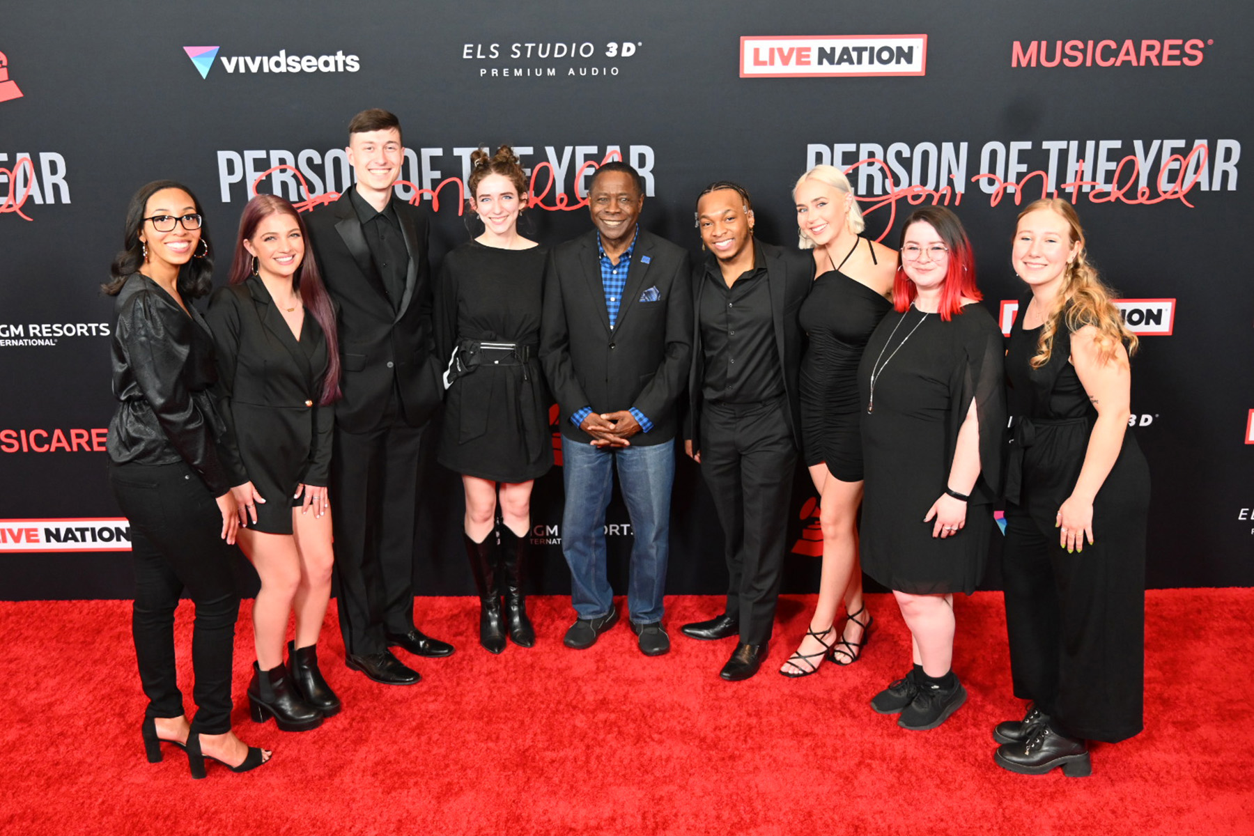 MTSU President Sidney A. McPhee, center, stands with students and recent alumni from the university’s Department of Recording Industry on the red carpet before Friday night’s MusiCares fundraiser at the site of the 2022 Grammy Awards in Las Vegas. (MTSU Photo by Andrew Oppmann)