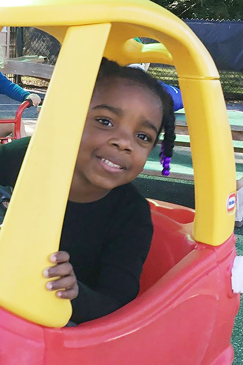 One of the little learners at MTSU's Ann Campbell Early Learning Center prepares for her busy commute in the center’s playground in this file photo. The nonprofit, inclusive preschool, an arm of MTSU’s College of Education, is welcoming supporters of all ages to its 15th annual "Saddle Up" fundraiser on Saturday, April 30. For more information, visit https://www.mtsu.edu/acelearningcenter/saddleup.php. (Photo courtesy of the Ann Campbell Early Learning Center at MTSU)