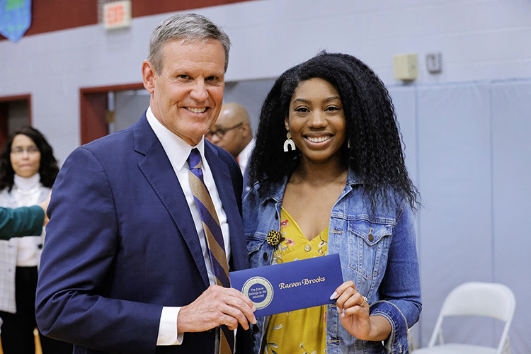 Tennessee Gov. Bill Lee was one of many officials in attendance at an assembly at Black Fox Elementary School in Murfreesboro, Tenn., to surprise Raeven Brooks, second-grade teacher and Middle Tennessee State University graduate, with a Milken Educator Award recognizing her as an outstanding educator on April 7, 2022. (Photo courtesy of Milken Family Foundation)