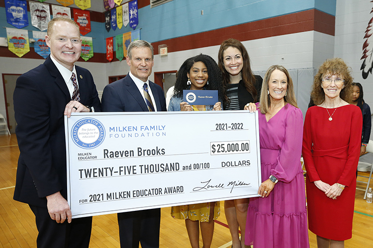 Tennessee Gov. Bill Lee was one of many officials in attendance at an assembly at Black Fox Elementary School in Murfreesboro, Tenn., to surprise Raeven Brooks, second-grade teacher and Middle Tennessee State University graduate, with a Milken Educator Award recognizing her as an outstanding educator on April 7, 2022. (Photo courtesy of Milken Family Foundation)