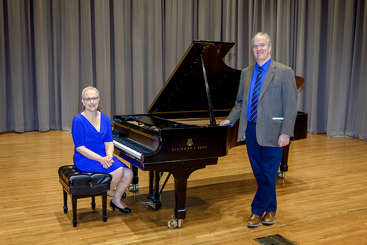 Christine Whelchel, Middle Tennessee State University graduate music student, and Joseph Morgan, School of Music associate professor and director of graduate studies, shared the stage at the School of Music’s Hinton Hall on March 21, 2022, and spoke about why experienced and professional musicians are choosing to further their education with MTSU’s graduate music program. (MTSU photo by J Intintoli)