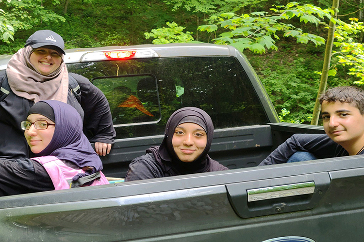 From left, MTSU student Khadijah Alnassari and her triplets, Fatimah, Zaynab, and Ahmad Alnassari, who also are MTSU students.