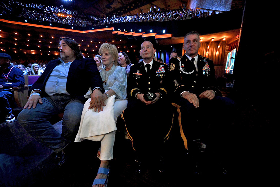 Charlie Daniels Jr., left, his mother, Hazel Daniels, MTSU’s Keith M. Huber and U.S. Army Reserve Command Sgt. Maj. Andrew Lombardo sit in the audience at the Grand Ole Opry Salute to Troops show Tuesday, May 24, at the Grand Ole Opry House in Nashville, Tenn. The Daniels Veterans Center at MTSU is named in honor of Hazel Daniels and her late husband, Country Music Hall of Fame member Charlie Daniels, who was a strong advocate for veterans. (MTSU photo by James Cessna)