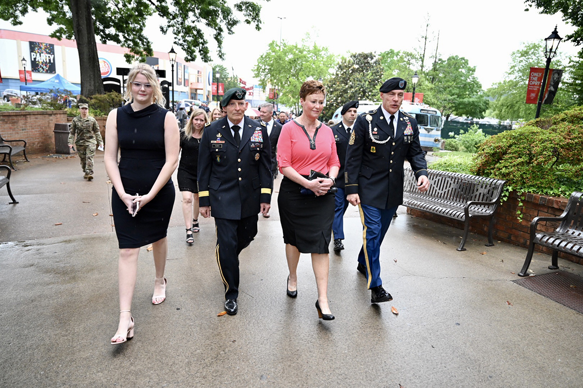 Alexis Huber, left, walks with her parents, Army LTG(R) Keith Huber and Shelly Huber, along with U.S. Army Reserve Command Sgt. Maj. Andrew Lombardo Tuesday, May 24, as they head to the Grand Ole Opry House in Nashville, Tenn. They attended the Opry’s annual Salute to Troops show. (MTSU photo by James Cessna)