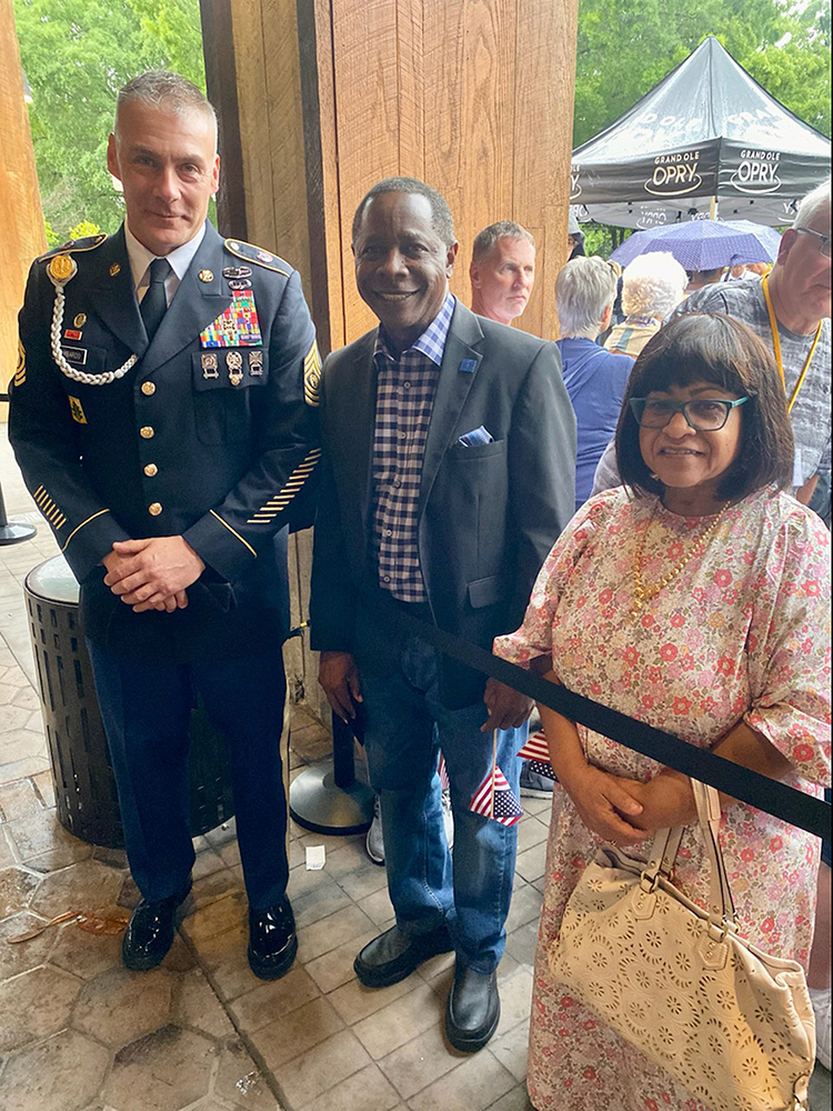 U.S. Army Reserve Command Sgt. Maj. Andrew Lombardo, left, visits with MTSU President Sidney A. McPhee and first lady Elizabeth McPhee Tuesday, May 24, outside the Grand Ole Opry House in Nashville, Tenn. They attended the Opry’s annual Salute to Troops show. Lombardo spent part of his day touring the Daniels Veterans Center, meeting criminal justice and military science staff and learning what the university has to offer for veteran students. (MTSU photo by Andrew Oppmann)