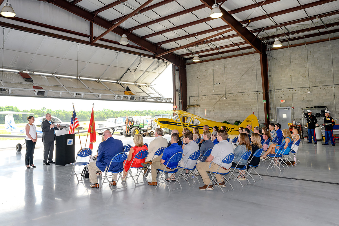 Family, friends and MTSU faculty and administrators attend the May 20 commissioning ceremony for aerospace professional pilot major Isaac Wehner of Medina, Tenn. He commissioned as a second lieutenant into the U.S. Marine Corps in the ceremony held in the Donald McDonald Hangar at MTSU’s Flight Operations Center at Murfreesboro Airport. (MTSU photo by J. Intintoli)