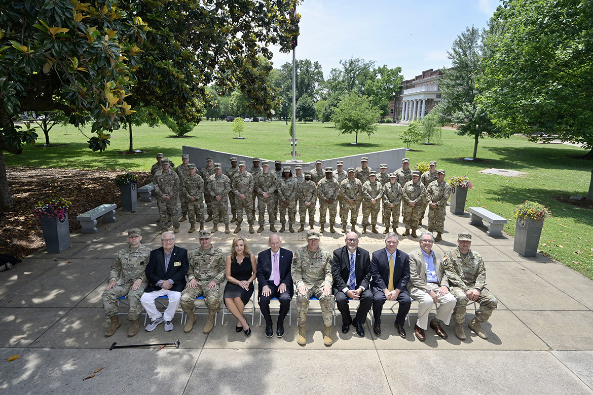 Army Reserve soldiers from across Tennessee, as well as four of the state’s five citizen Army Reserve ambassadors, came to MTSU to be a part of the visit to campus by U.S. Army Reserve Command Sgt. Maj. Andrew Lombardo, seated center, at the MTSU Veterans Memorial site outside the Tom H. Jackson Building. (MTSU photo by Andy Heidt)