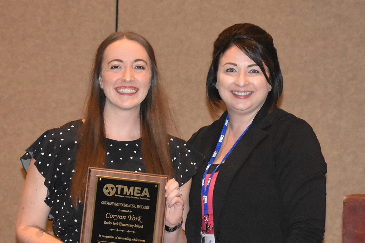 Corynn York, left, Middle Tennessee State University alumna and elementary music teacher at Rocky Fork Elementary School in Smyrna, Tenn., received the Outstanding Young Music Educator Award from the Tennessee Music Education Association, or TMEA, at the TMEA professional development conference awards banquet in Nashville on April 28, 2022. (Photo courtesy of the Tennessee Music Education Association)