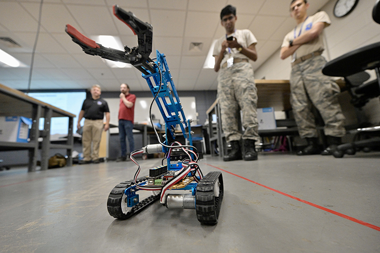 A Civil Air Patrol cadet operates a small robot Tuesday, June 28, at MTSU’s Davis Science Building. MTSU again is hosting the cadets for the U.S. Air Force volunteer civilian auxiliary’s National Cadet Engineering Technology Academy, also known as E-Tech, which runs June 26 through July 2 on the campus. (MTSU photo by Andy Heidt)