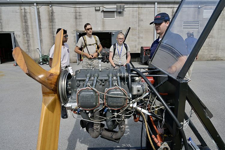 Civil Air Patrol cadets inspect an airplane engine Monday, June 27, during their visit to the MTSU Aerospace Department’s facilities at Murfreesboro Airport. The university is hosting about 40 selected cadets for the U.S. Air Force volunteer civilian auxiliary’s National Cadet Engineering Technology Academy, also known as E-Tech, which started June 26 and through July 2 on the campus. (MTSU photo by Andy Heidt)
